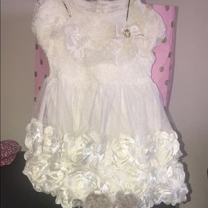 A combo that includes : boots, dress and  bandana